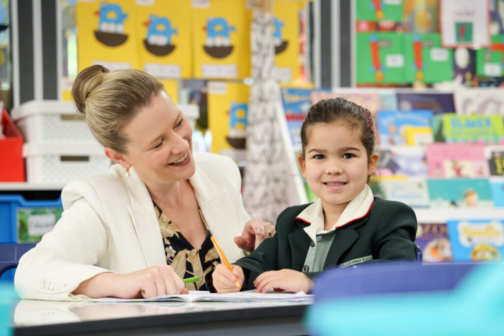 Mrs Newth helping her student